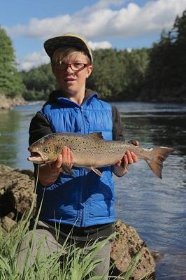 This is 12 year old Artem from Moscow, proudly showing off his first salmon ever! 2,8 kg - caught in sone 3,
